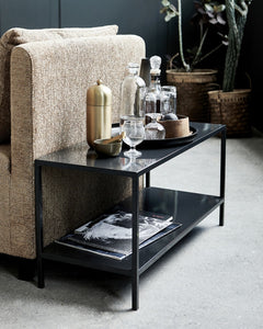 Glossy black finish coffee table. The industrial and sleek look is a good balance alongside upholstered furniture. The lower shelf is convenient for storing magazines or books, and the upper one is suitable for a vase, tray or table lamp.