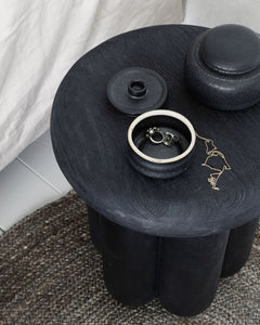 A side table can take part in creating life and personality in the decor and this table, Phant, from House Doctor is no exception. The unique side table is made of black stained tree which provides the surface with a unique look