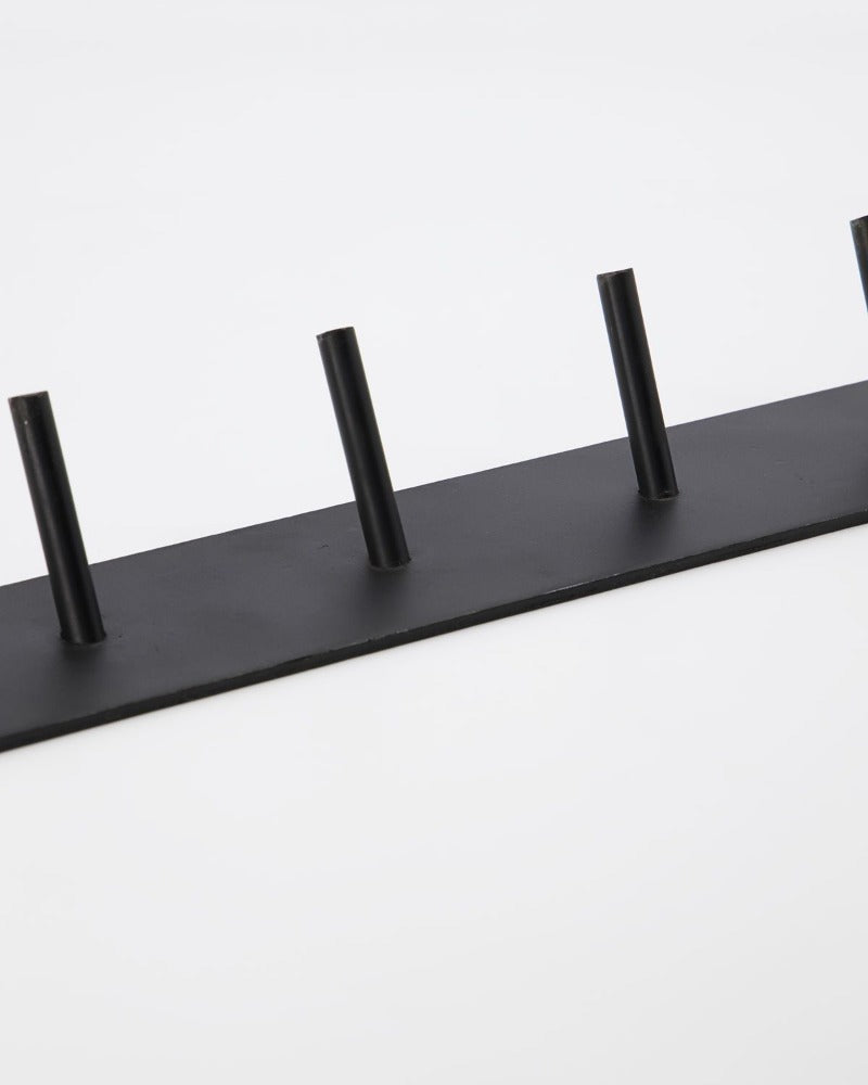 A simple, black coat rack for your bedroom. And yet so striking with its timeless and stripped back design. The coat rack is called Kyrkja, is made of iron and comes with 7 hooks. Mount it on the wall in your bedroom as a place to store your kimono, loungewear, jackets, bags or whatever your need may be